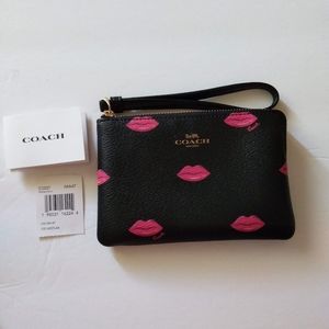 Coach Pink Lips Wristlet